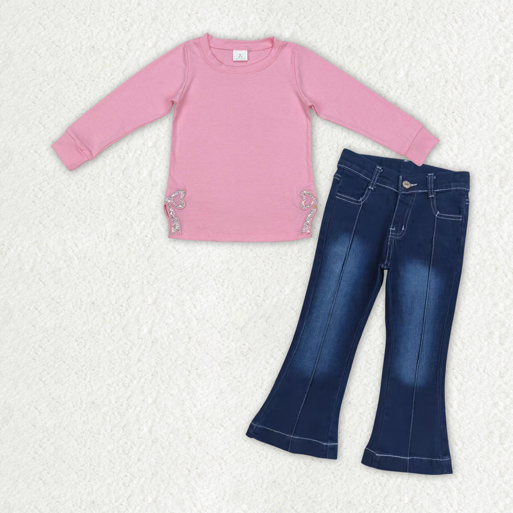 Pink bow long sleeve top blue jeans pants outfit