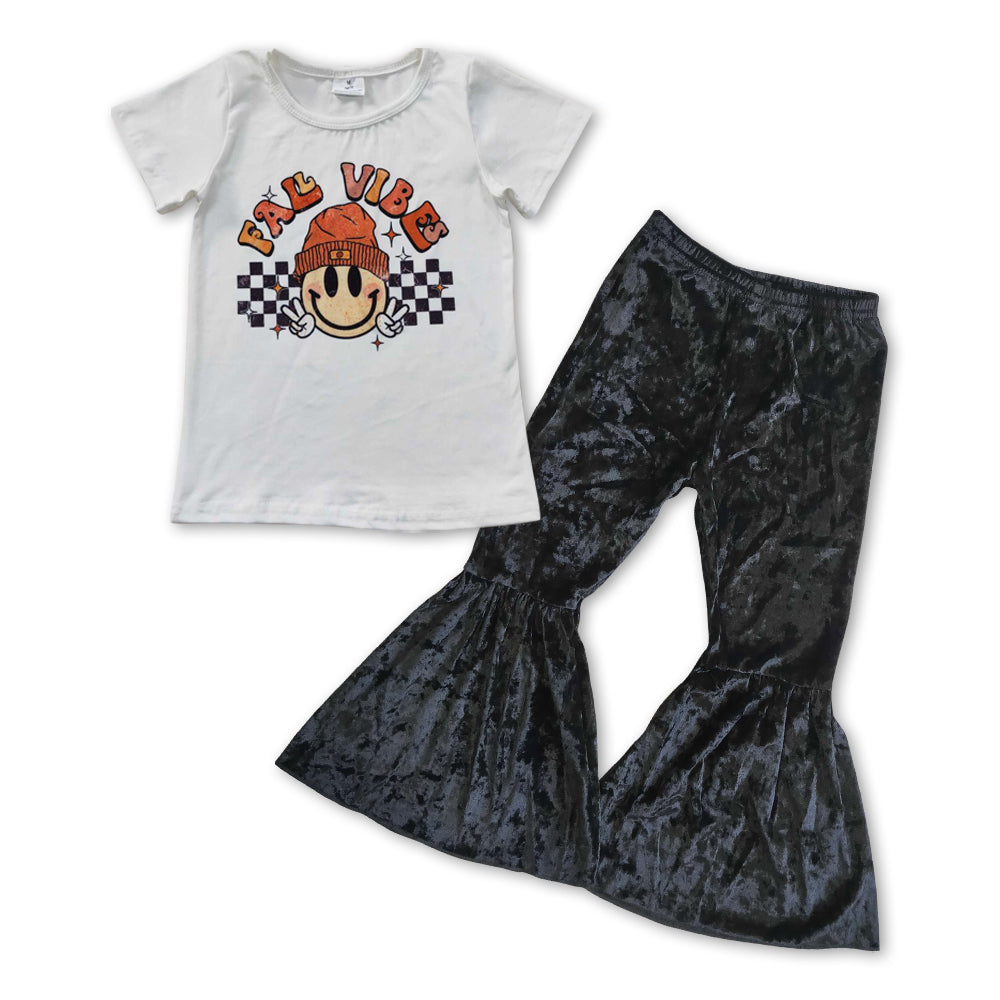 smile face top black velvet bell bottoms outfit