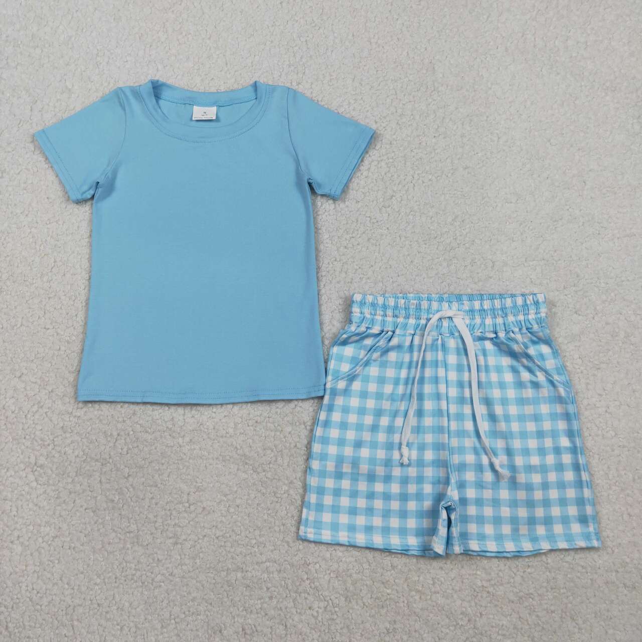 Blue top matching plaid shorts boy summer outfit
