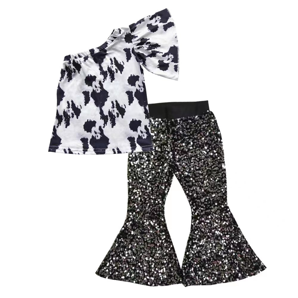 cowhide one shoulder top black sparking bell bottoms outfit