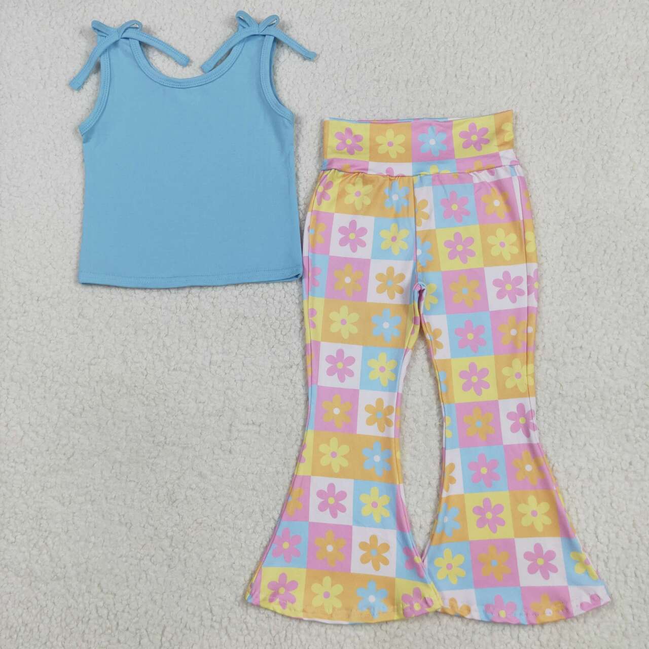 Blue shirt matching flowers bell bottoms outfit