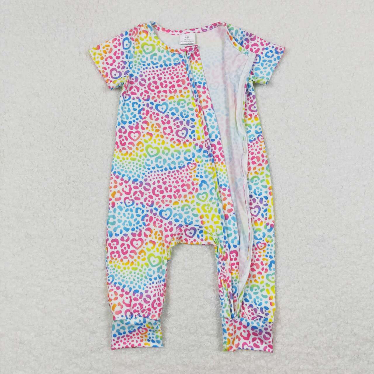 rainbow cheetah zip romper