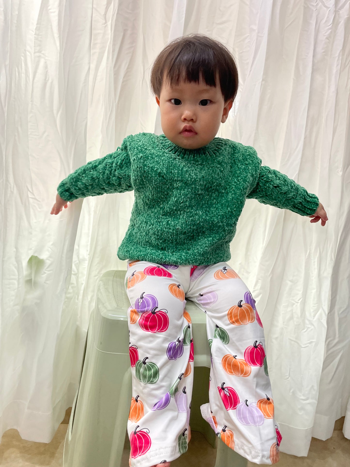 green long sleeve sweater pumpkin bell bottoms fall outfit