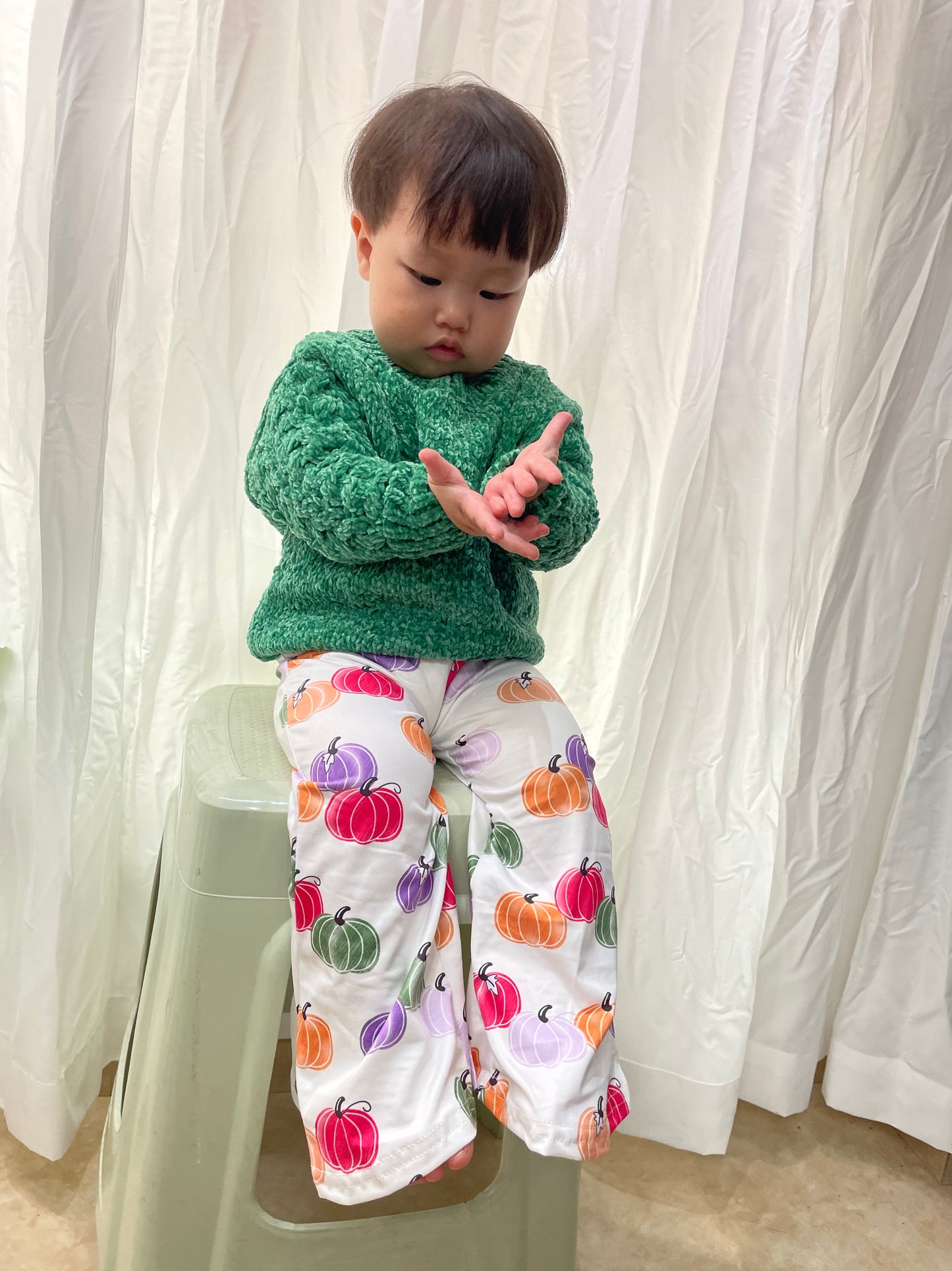 green long sleeve sweater pumpkin bell bottoms fall outfit