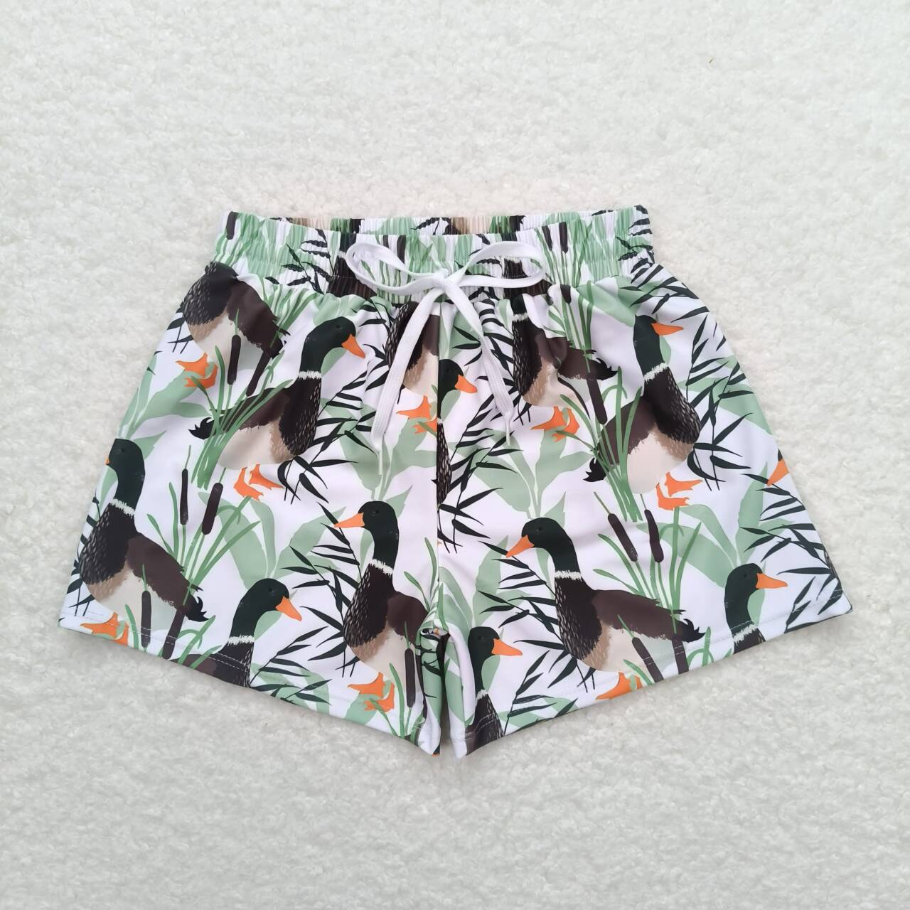 Boy mallard duck  swim trunks