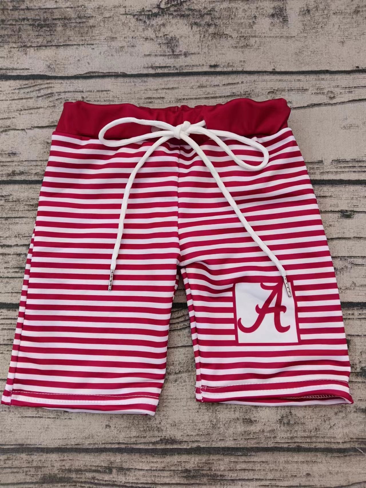 baby boy team design swim trunks
