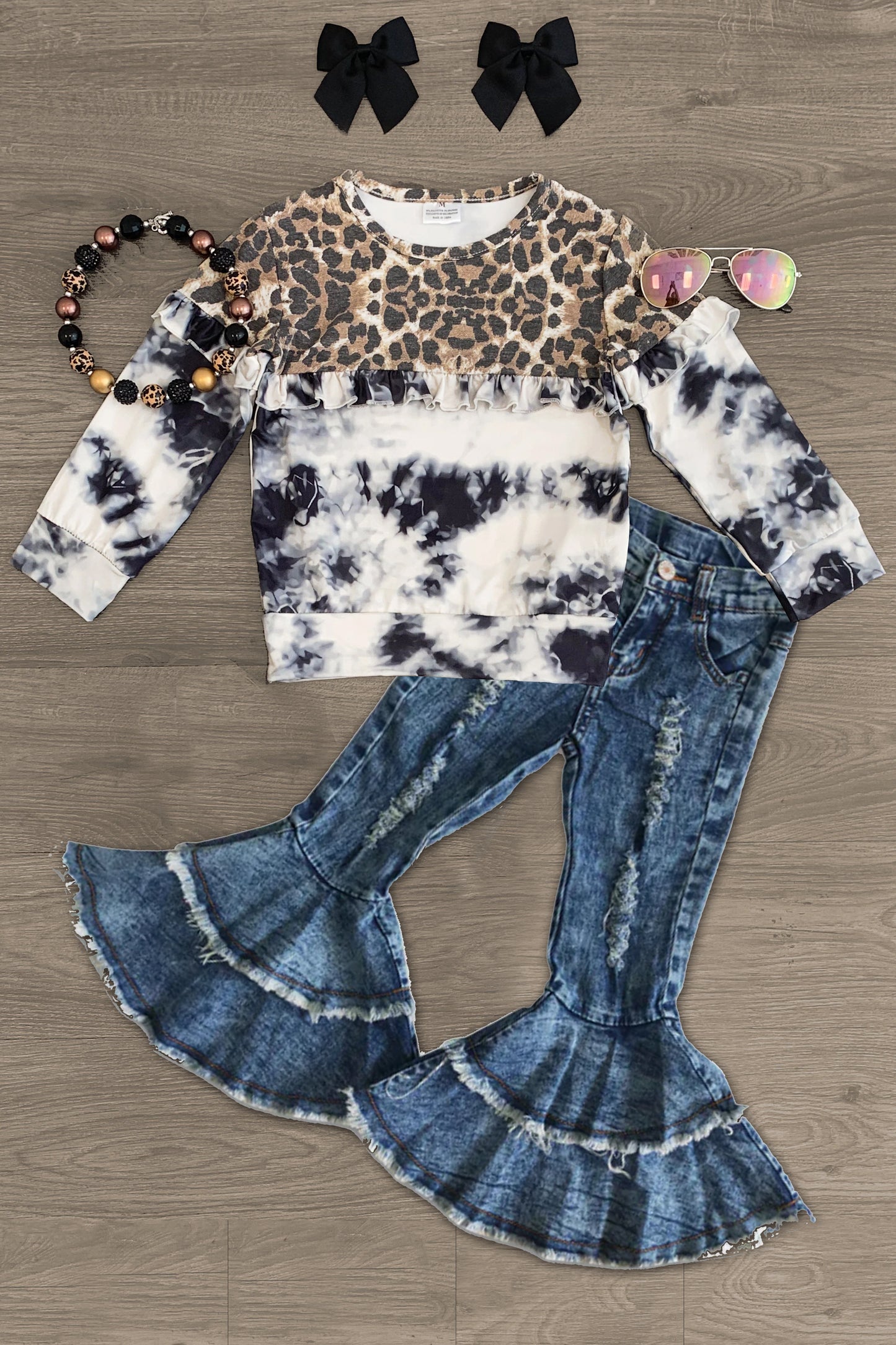 cheetah tie dye shirt distressed jeans bell bottoms outfit