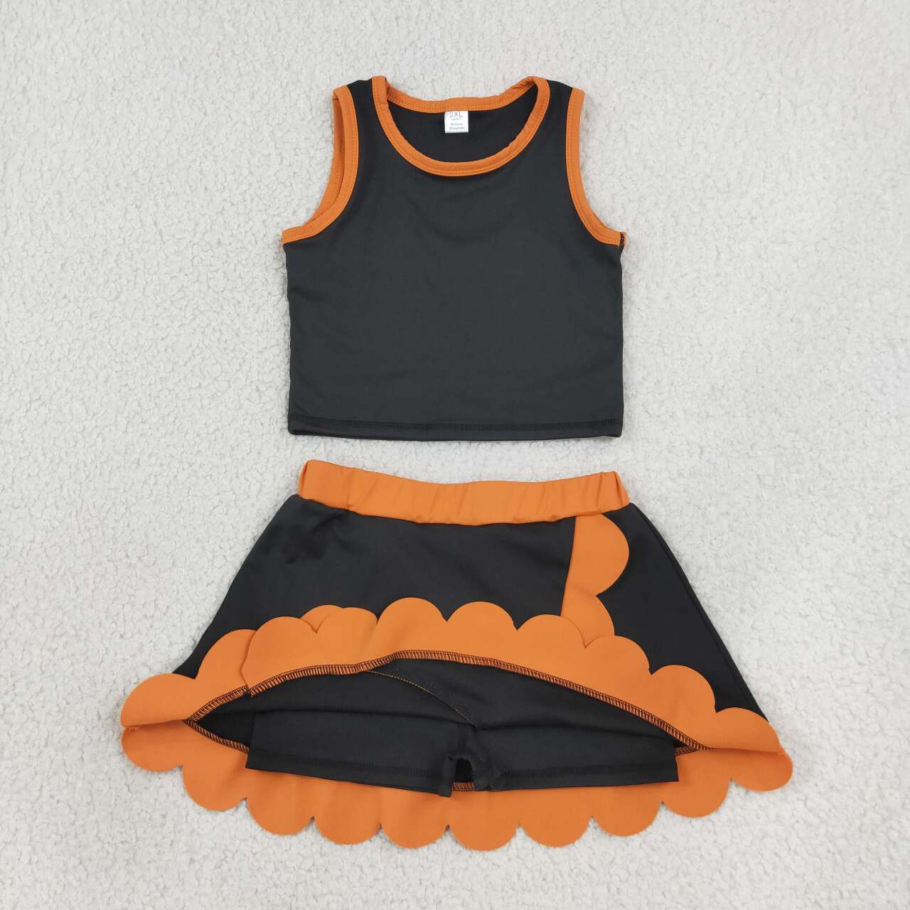 Black orange sleeveless yoga top matching skorts girls outfit