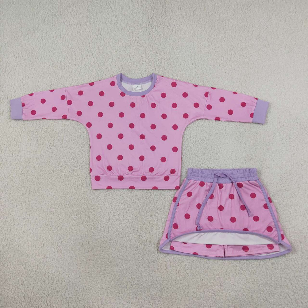 Pink color polka dots long sleeve top matching shorts girls outfit