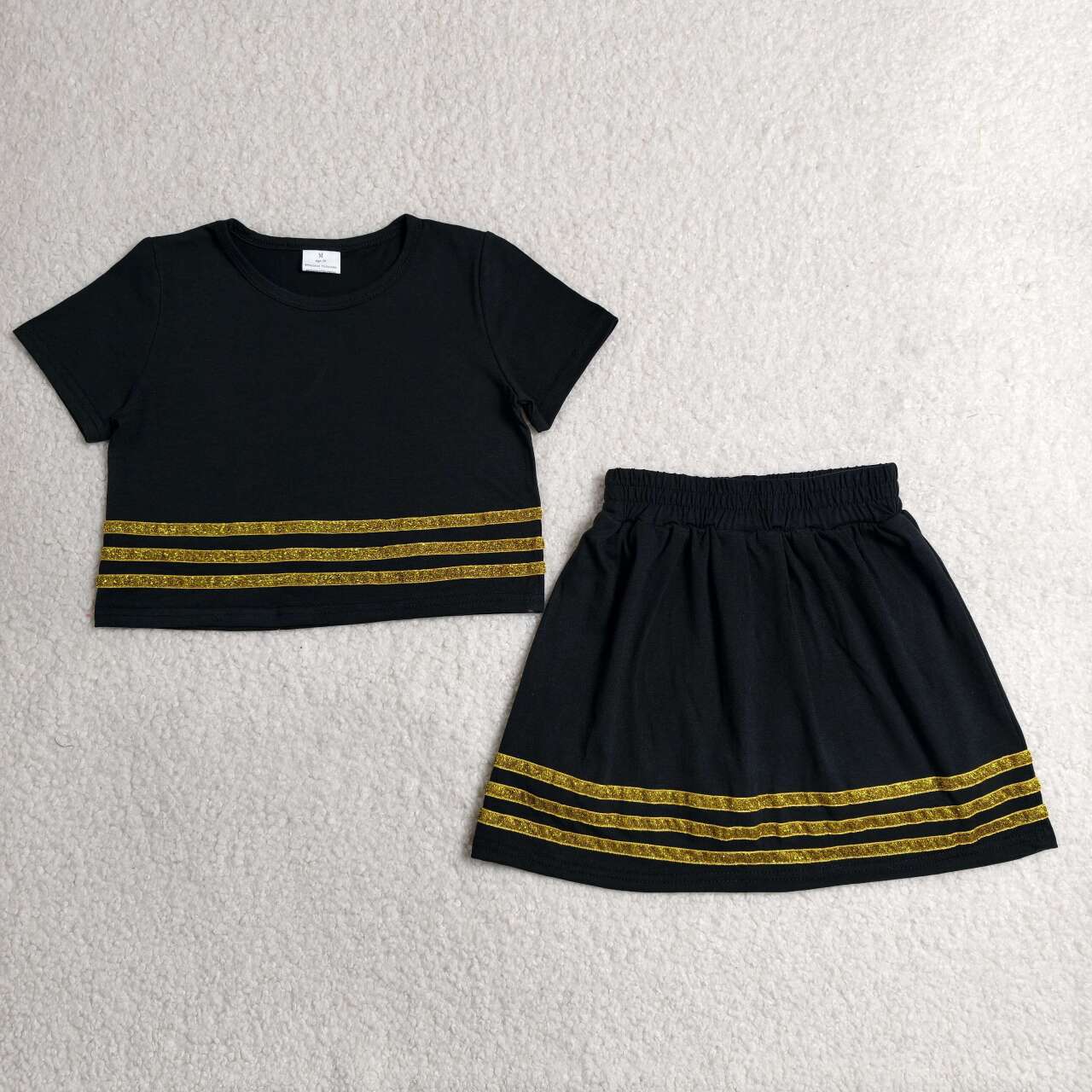Black short sleeve top matching skort outfit