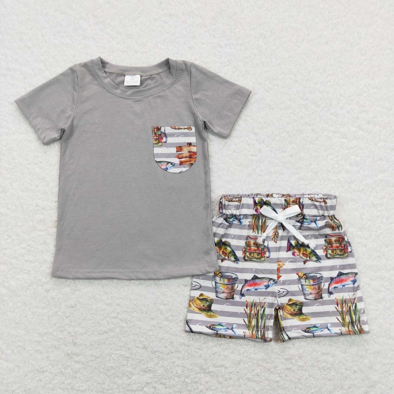 boy grey top fishing shorts outdoor outfit