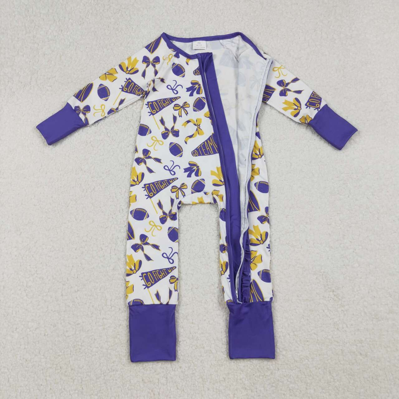 Purple bow football design girls long sleeve romper