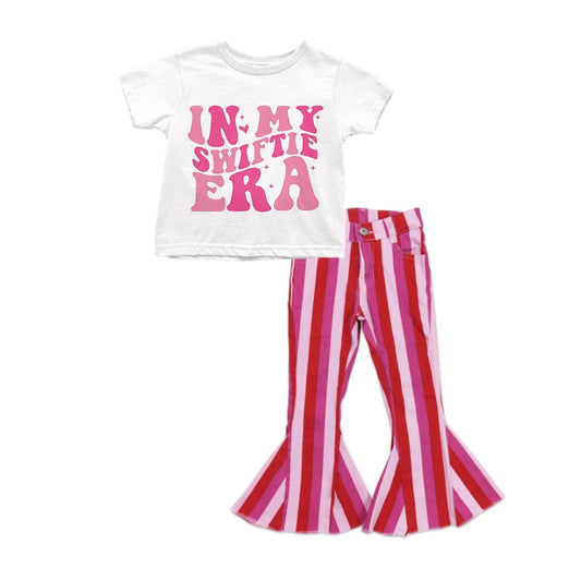 country music singer top pink jeans stripes bell bottoms outfit