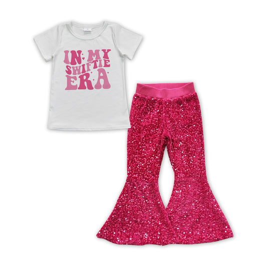 Country music singer shirt hot pink sequins bell bottoms outfit