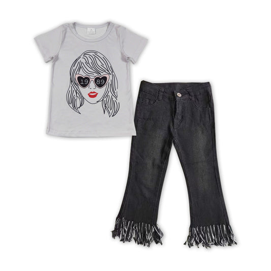 counrty music singer shirt black jeans bell bottoms outfit