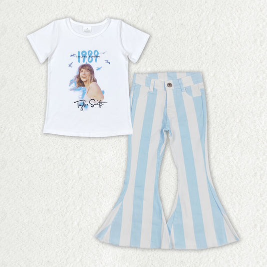 country music singer shirt blue stripes flare jeans outfit