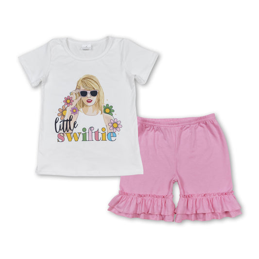 country music singer shirt dark pink shorts summer outfit