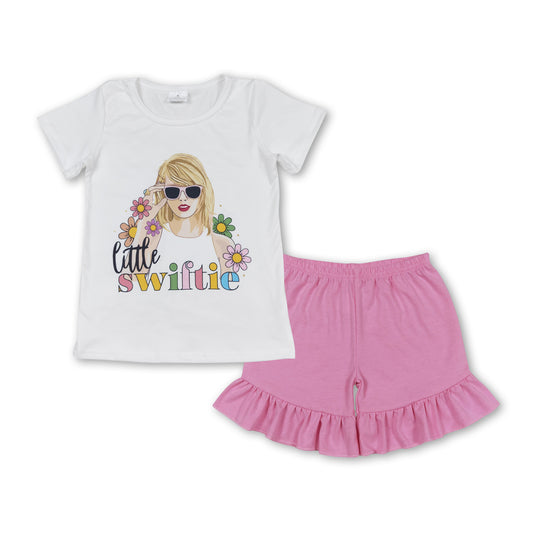 country music singer shirt dark pink shorts summer outfit
