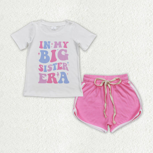 In my big sister ear shirt  pink sports shorts outfit