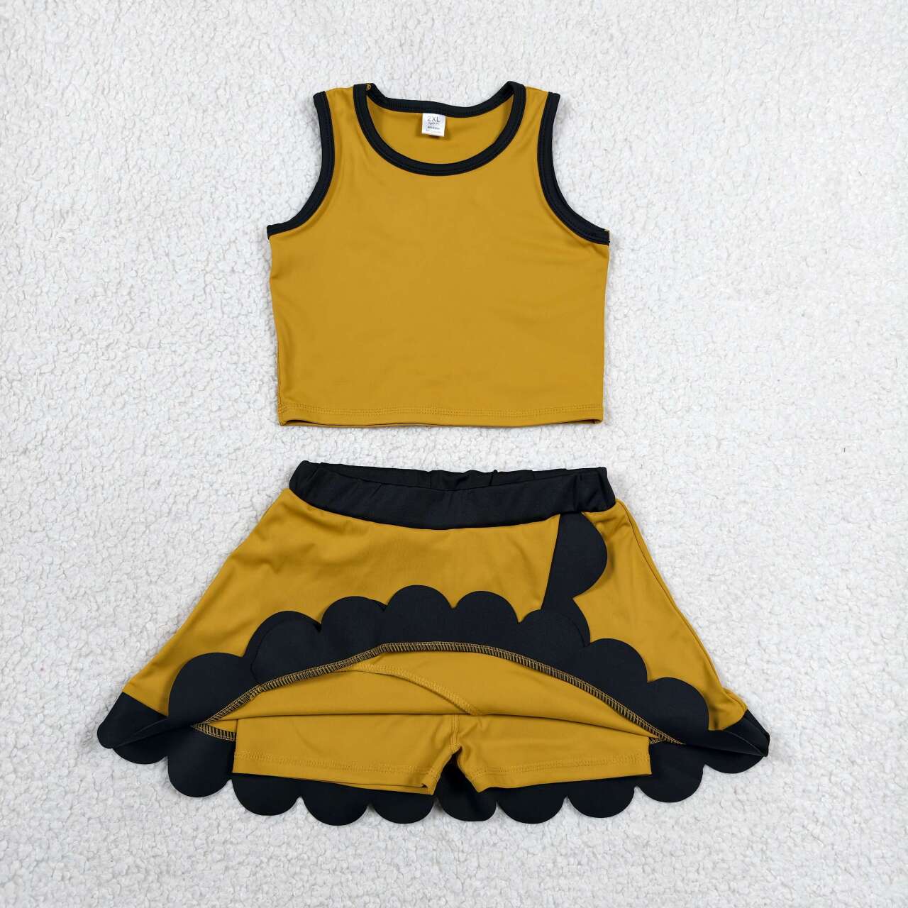 Girls golden yoga tank top matching skorts outfit