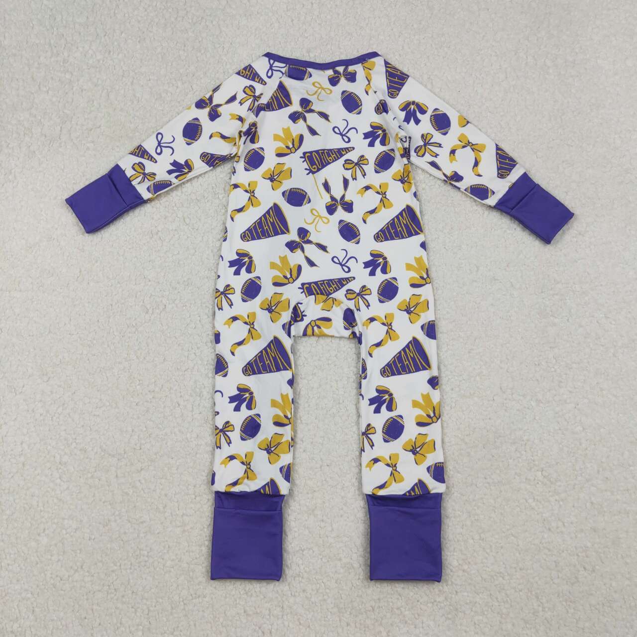 Purple bow football design girls long sleeve romper