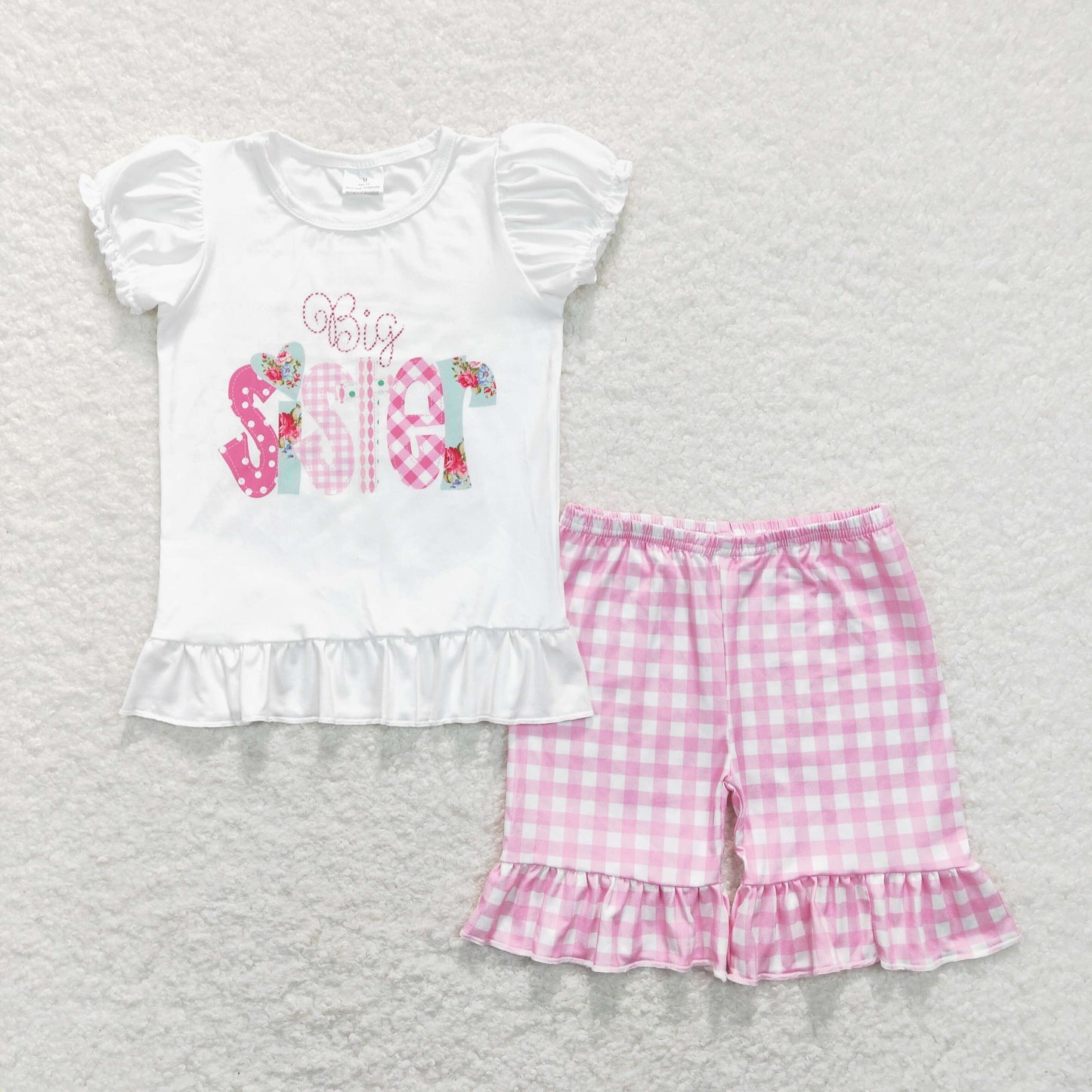 big sister short sleeve top pink plaid shorts outfit