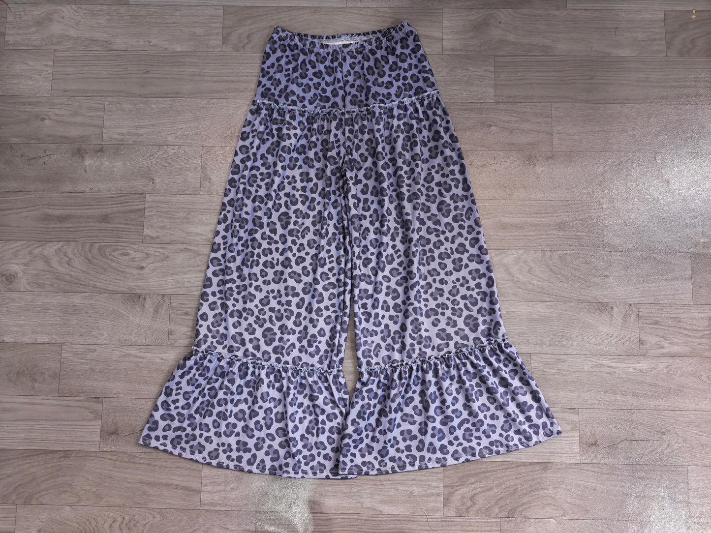 Girls black cheetah yoga flare pants preorder