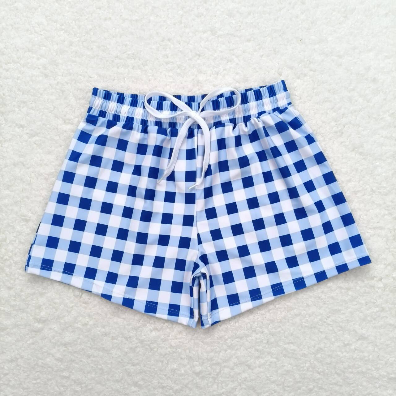 Boy blue checkered swim trunks