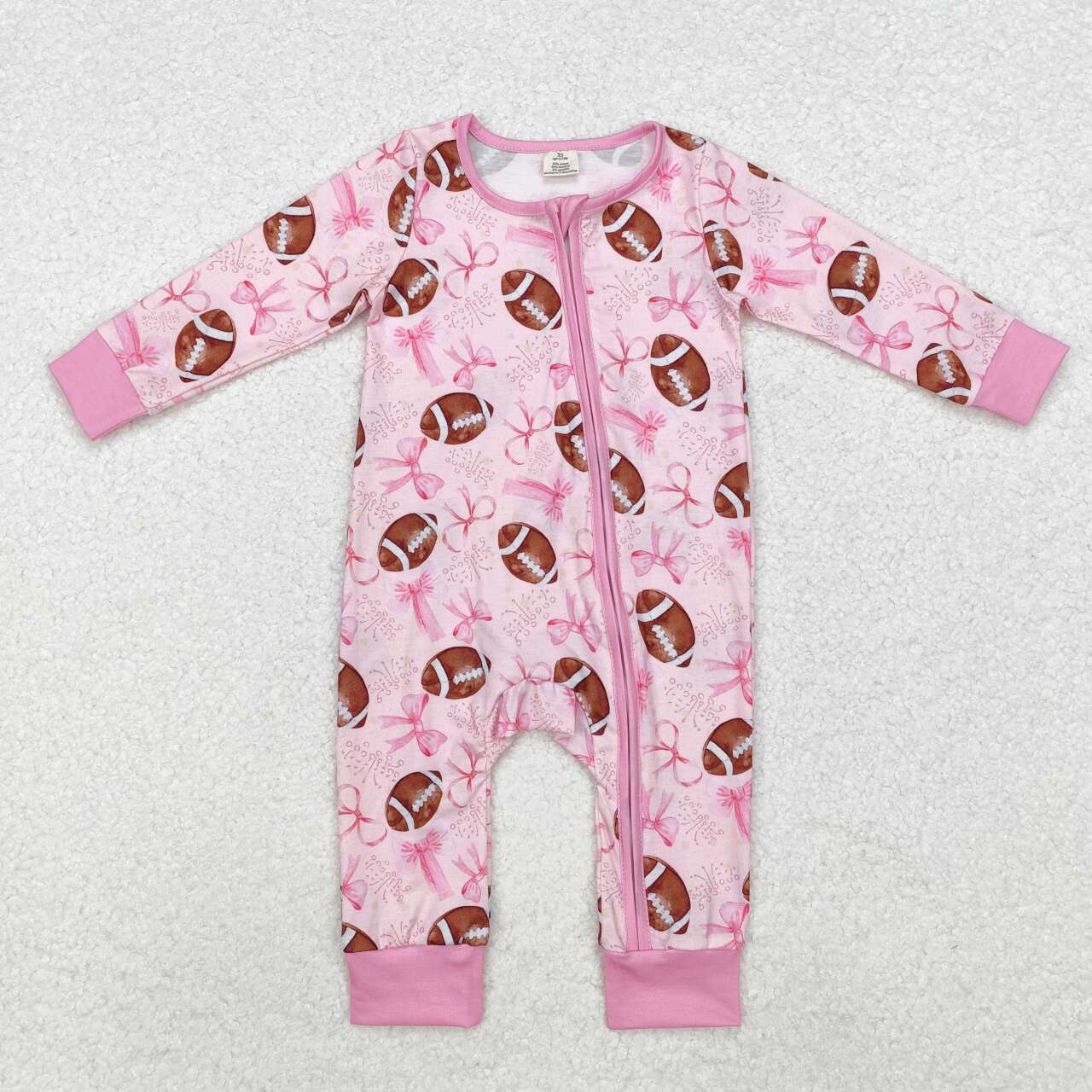 Football game day pink bow bamboo zip romper