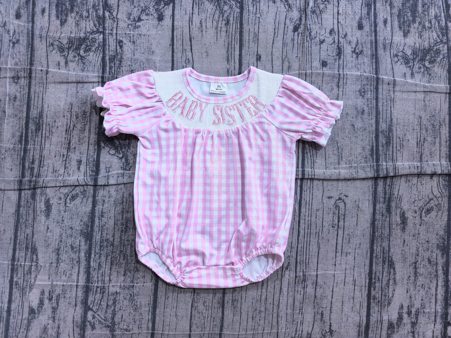 Baby sister pink plaid short sleeve smocked romper preorder