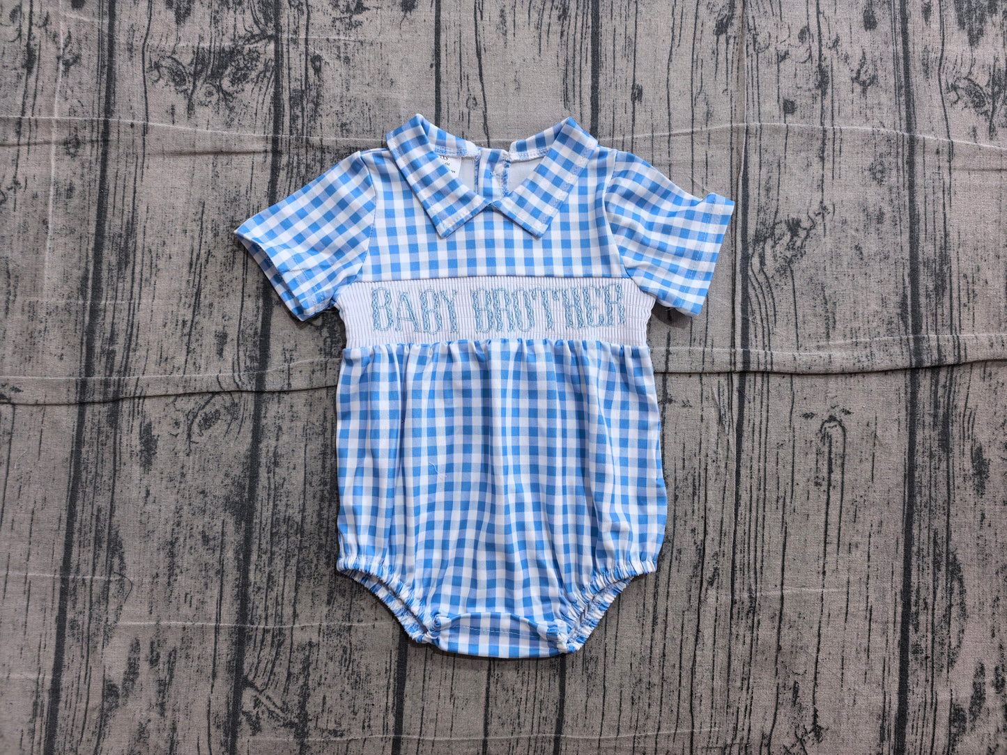 Baby sister blue plaid short sleeve smocked romper preorder