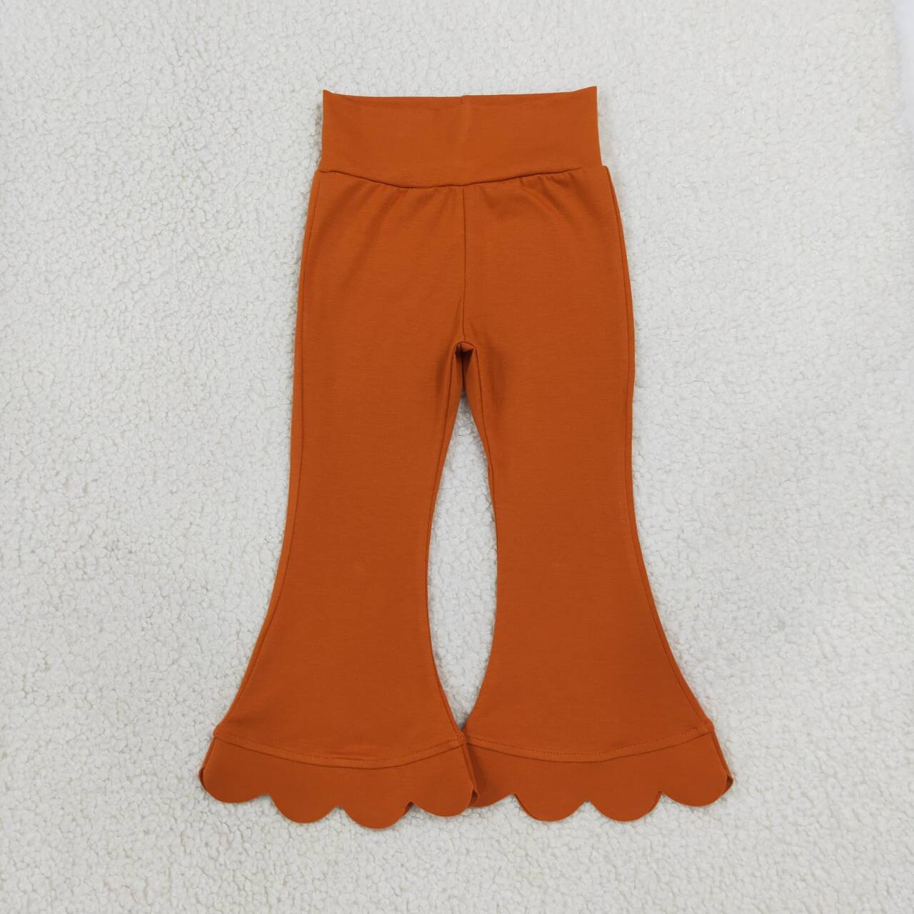 Orange color girls scalloped bell bottoms
