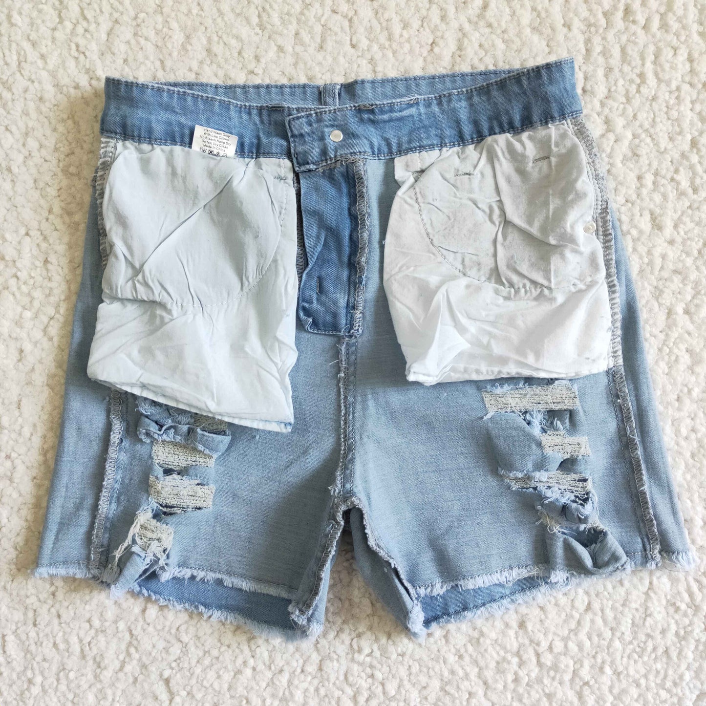 Adult distressed denim shorts