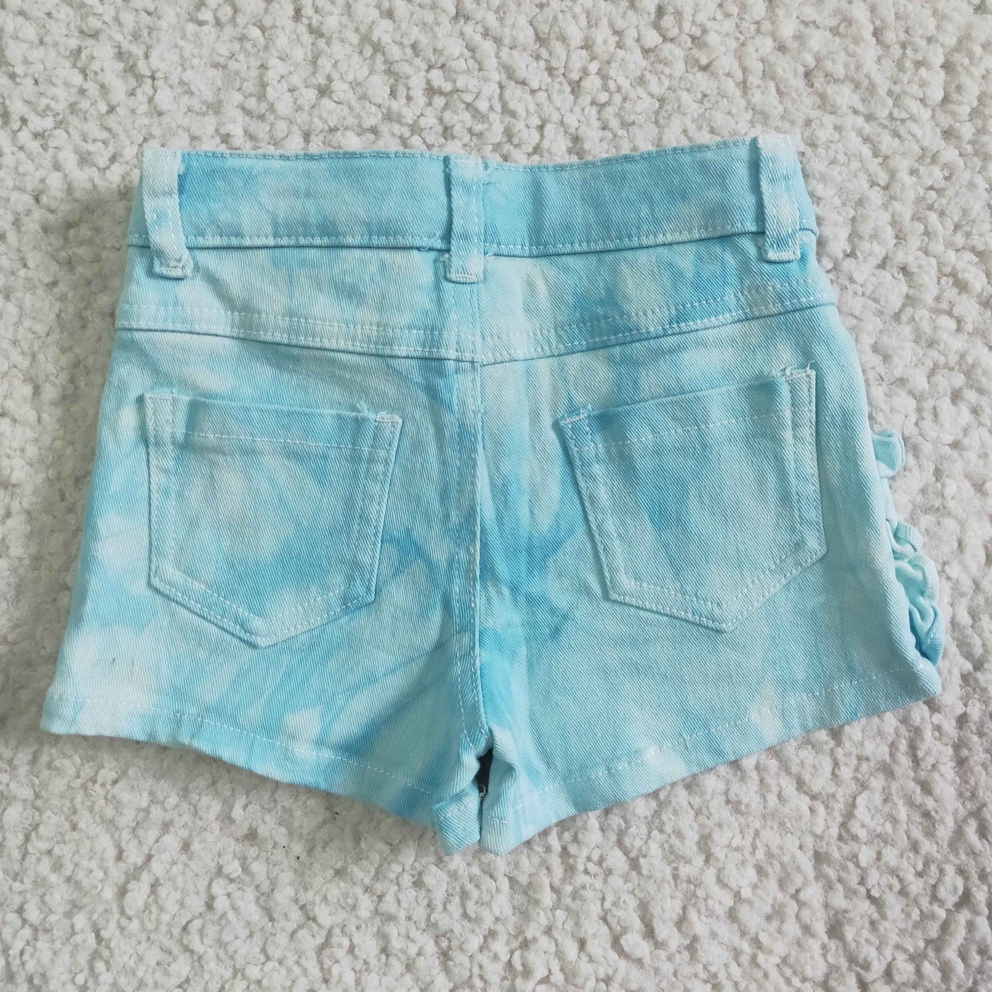 Turquoise distressed denim shorts