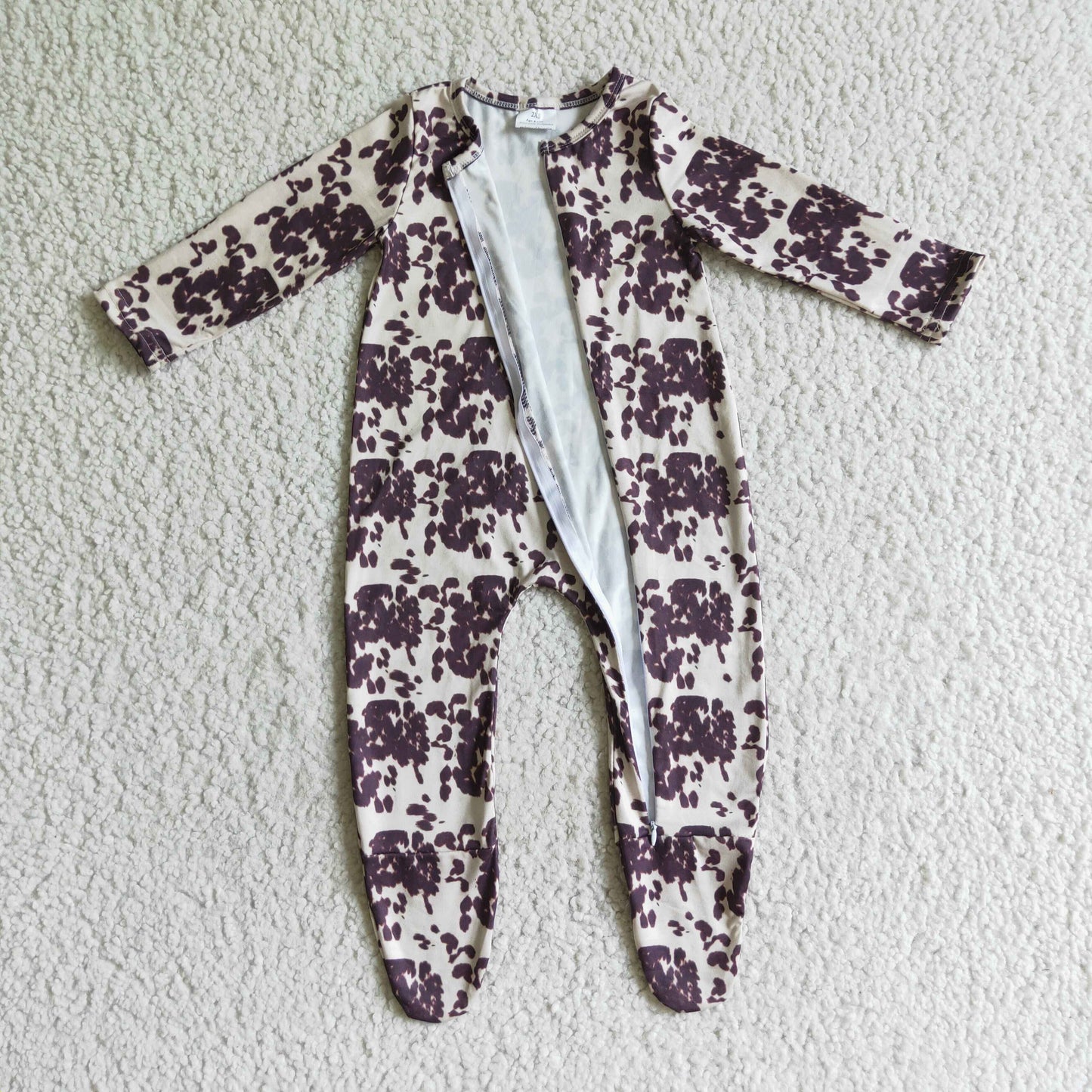 boy cowhide print footie romper