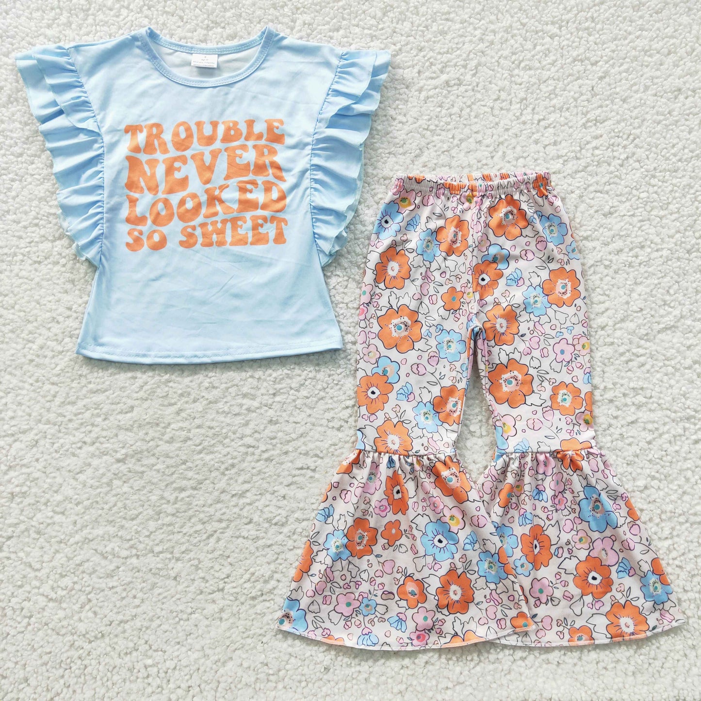 trouble never looked so sweet summer bell bottoms outfit